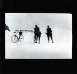 Out of focus scene of two men in the snow