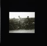 Boys with their cycles in the countryside