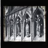 A row of live 'saints' in church arches