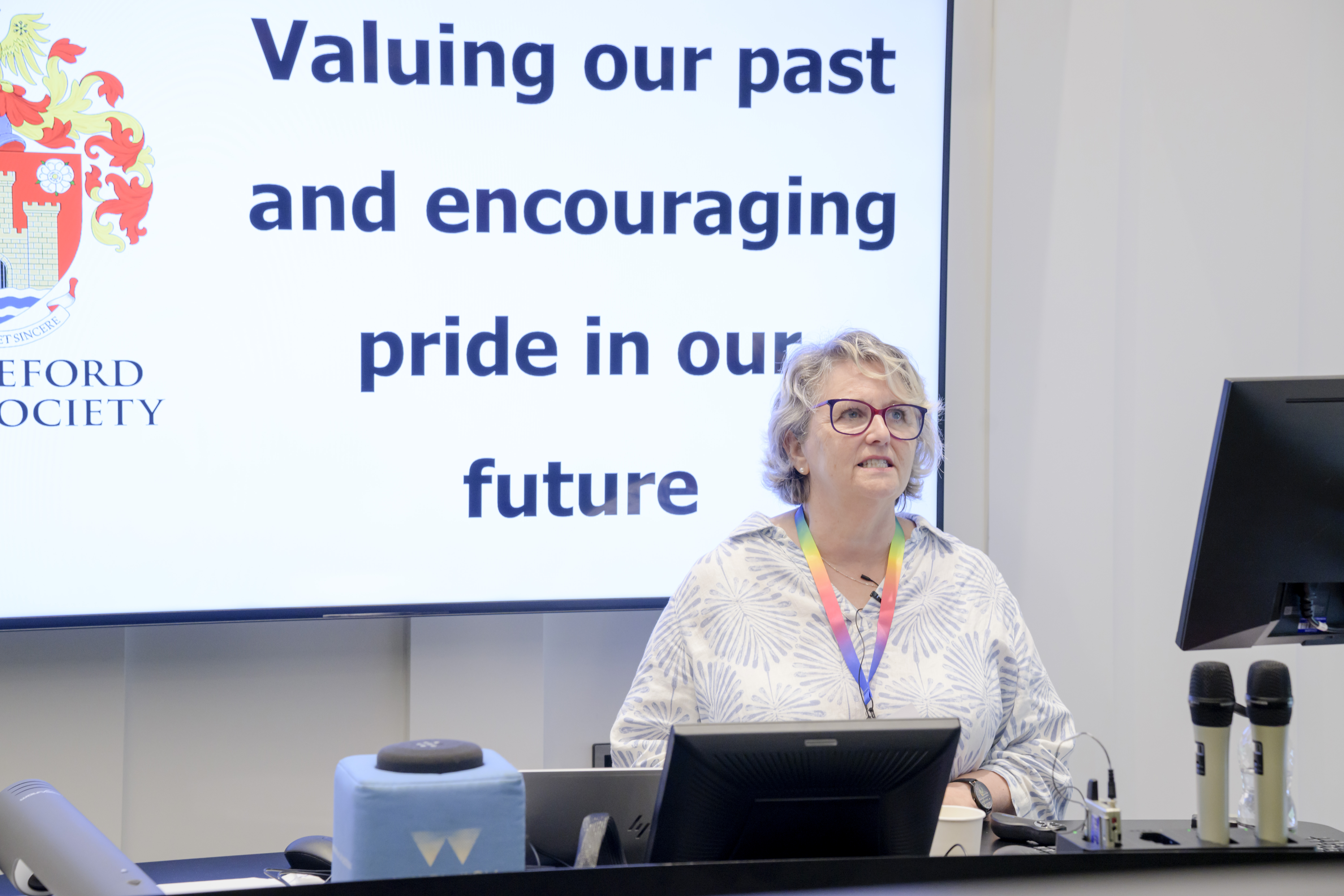 Photograph of one of the presenters giving a talk at the conference