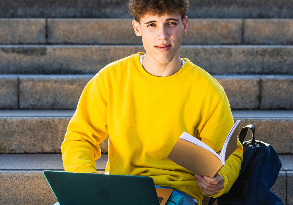 A photo of a student reading a text