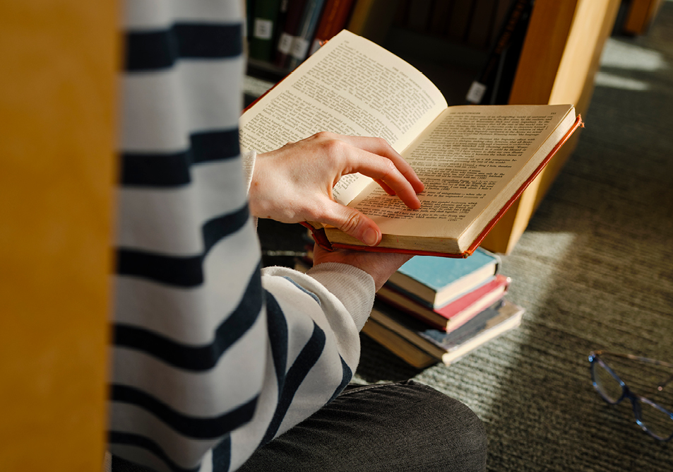 A picture of a student reading a book