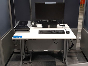 assistive technology height adjustable table