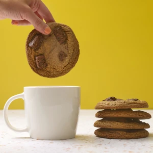 A brookie being dunked into coffee