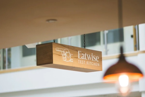 Eatwise Test Kitchen hanging sign