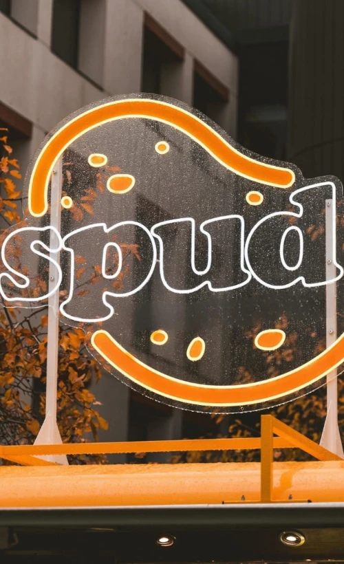 The Spud logo on the top of the van