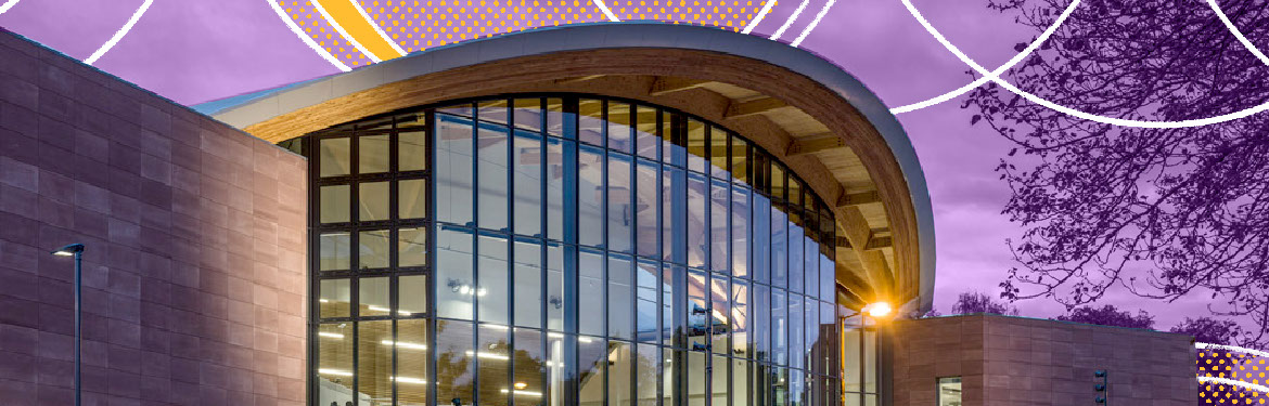 Decorative image - glass fronted University building lit up at night. Background is a purple overlay colour with white arc detail.