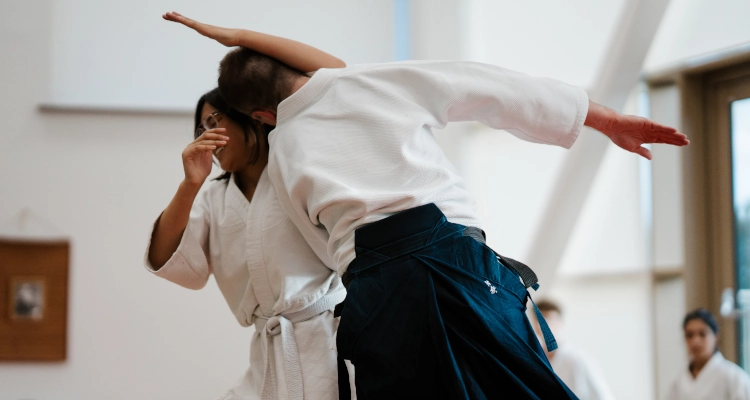 Elisha Caguiat participating in Aikido