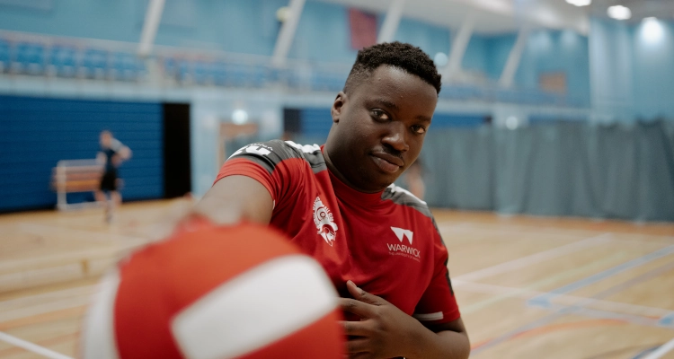 Playing dodgeball inside the sports and wellness hub