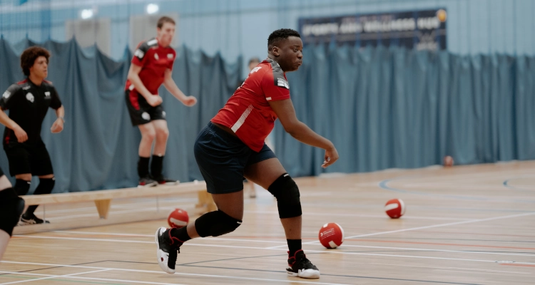 Playing dodgeball inside the sports and wellness hub