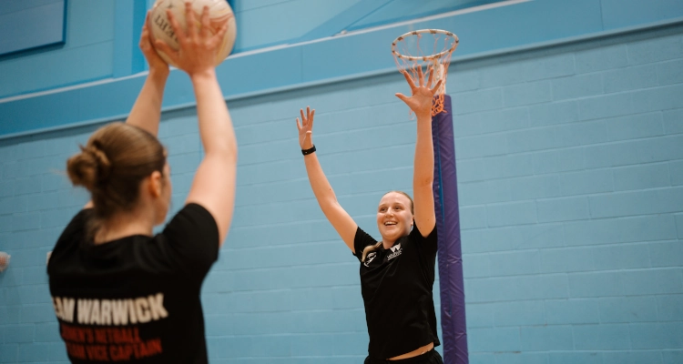 Tori Fisher playing netball in the Sports & Wellness Hub