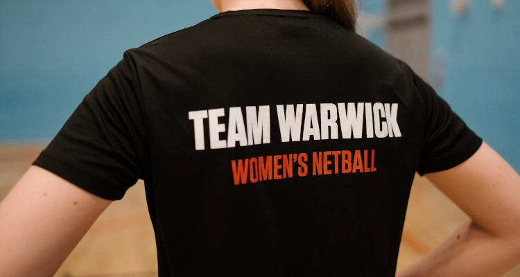 Tori Fisher playing netball in the Sports & Wellness Hub