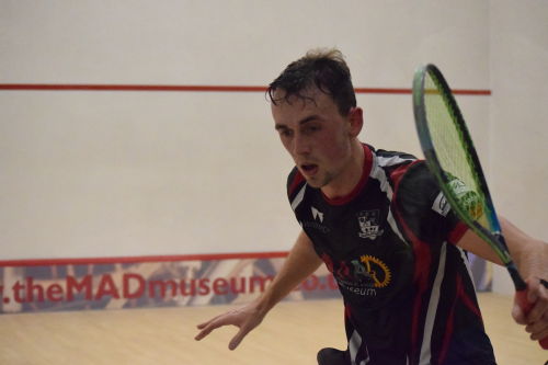Ashley Davies, squash player, focussing on the ball