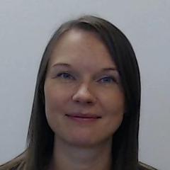 Image of a woman with straight brown hair on a white background.