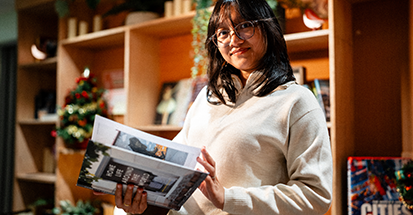 A student holding a brochure