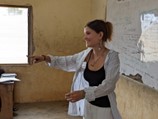 Izzy teaching in a classroom