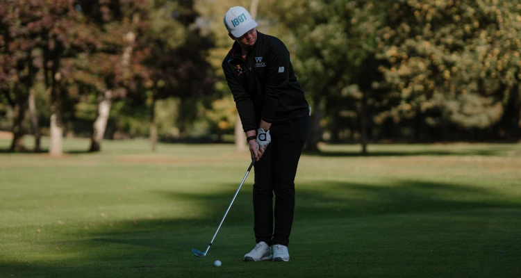 Arthur Duke playing a round of Golf