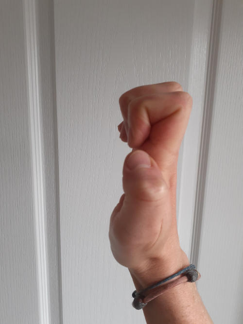 Hand making a hooked fist