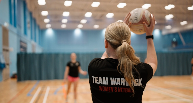 Tori Fisher playing netball in the Sports & Wellness Hub