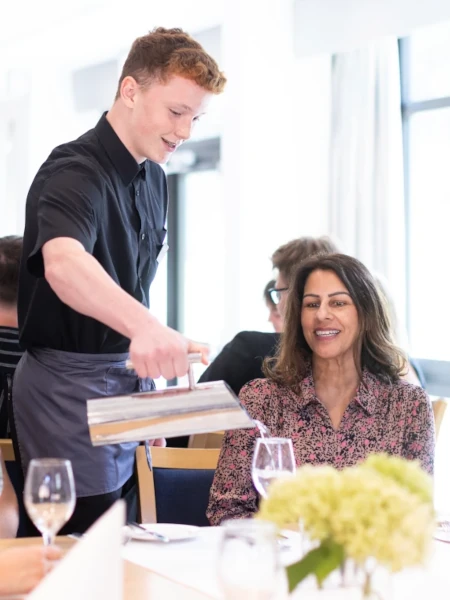 Waiters on hand to keep you hydrated and fed at our event space restaurants