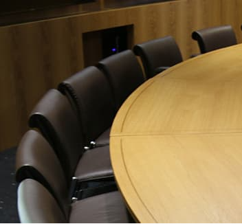 Table and chairs in boardroom