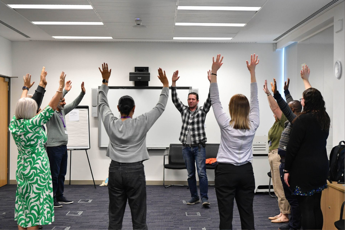 a laughter yoga class at University of Warwick