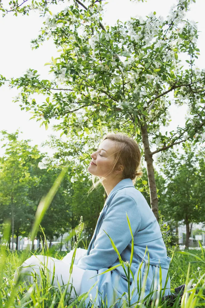 image of a woman relaxing outdoors