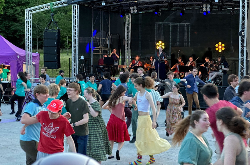Students dance to a ceilidh in the Piazza at Warwick Student Arts Festival