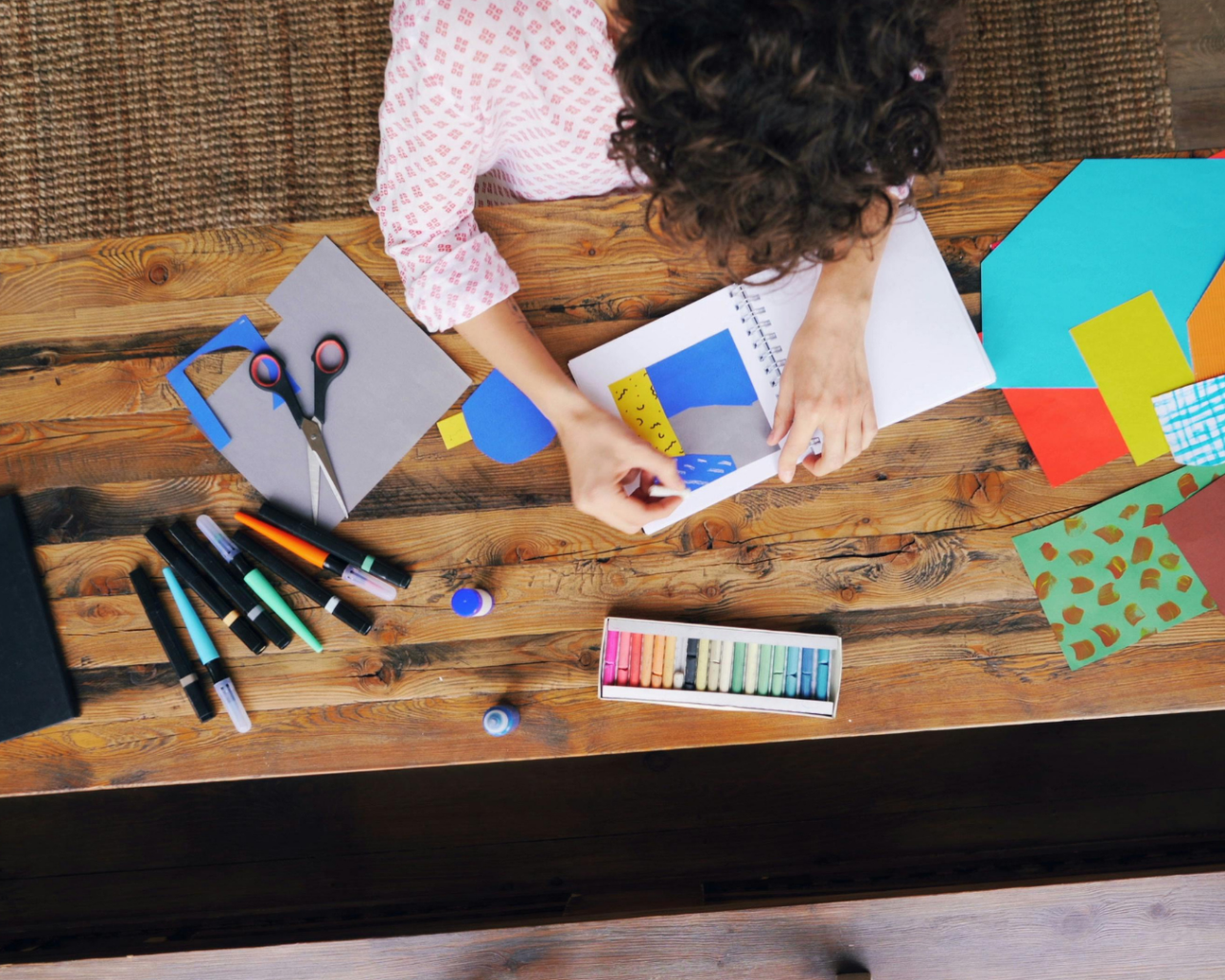 A student making some cards
