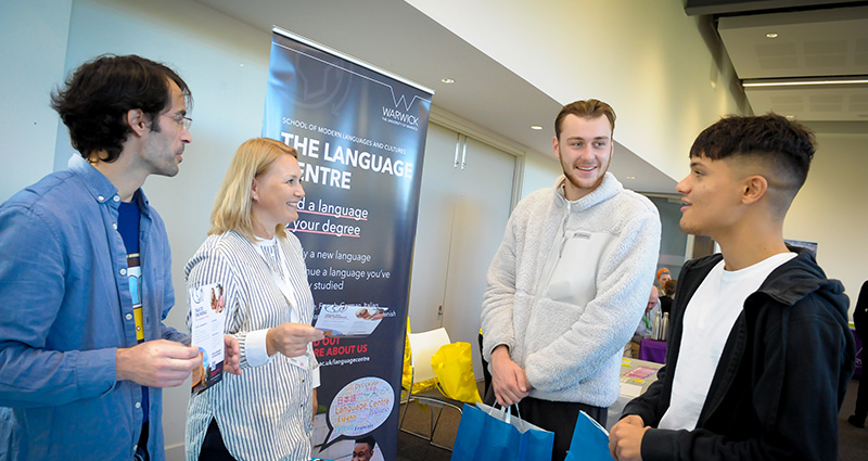 Members of staff chat with new students at the Life at University Fair