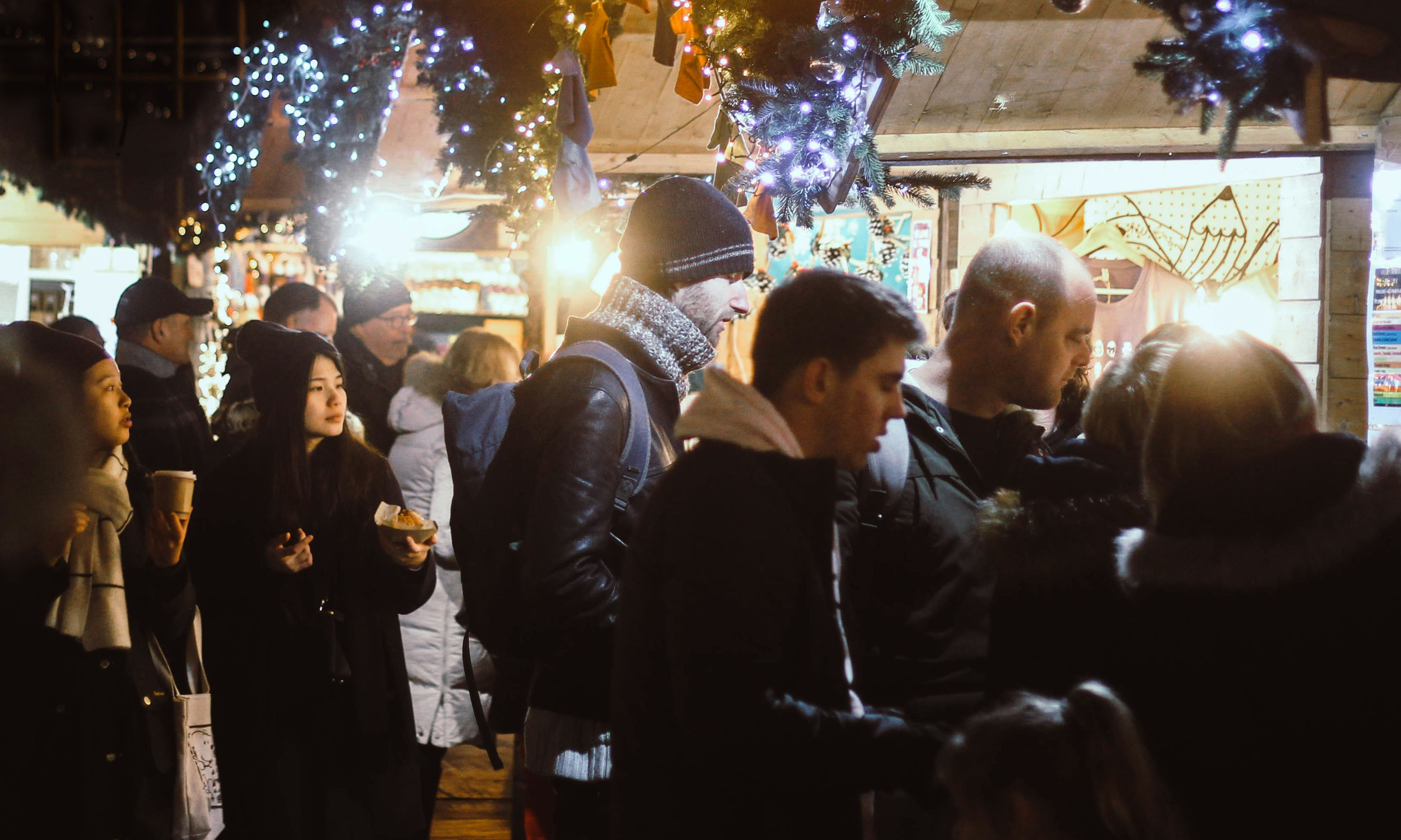 A group of student explore the Christmas Market