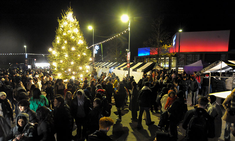 The busy Christmas market on the Piazza