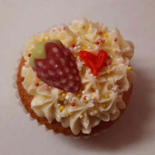 cupcake decorated with a strawberry