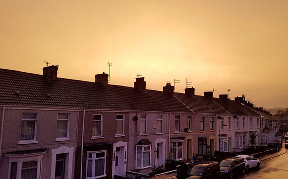A row of terraved houses at sunset