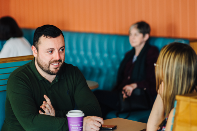 Two people in campus cafe