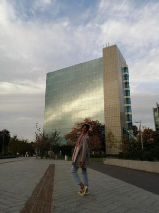 student in front of coventry building 