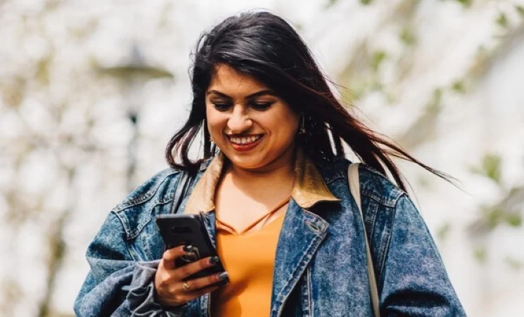 Student looking at phone