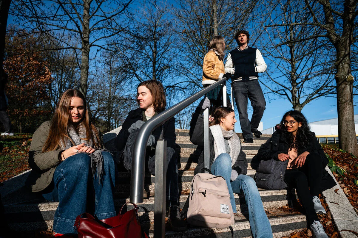 A group of students having friendly discussions
