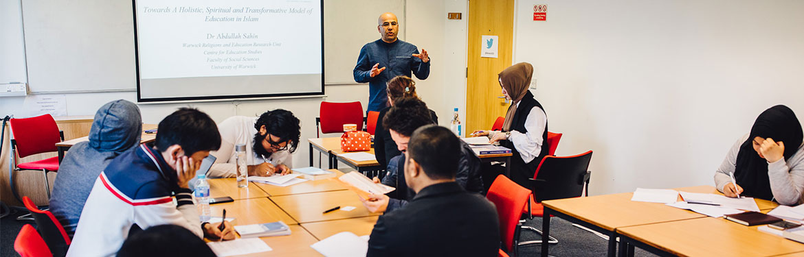 Islamic Education class with lecturer addressing students