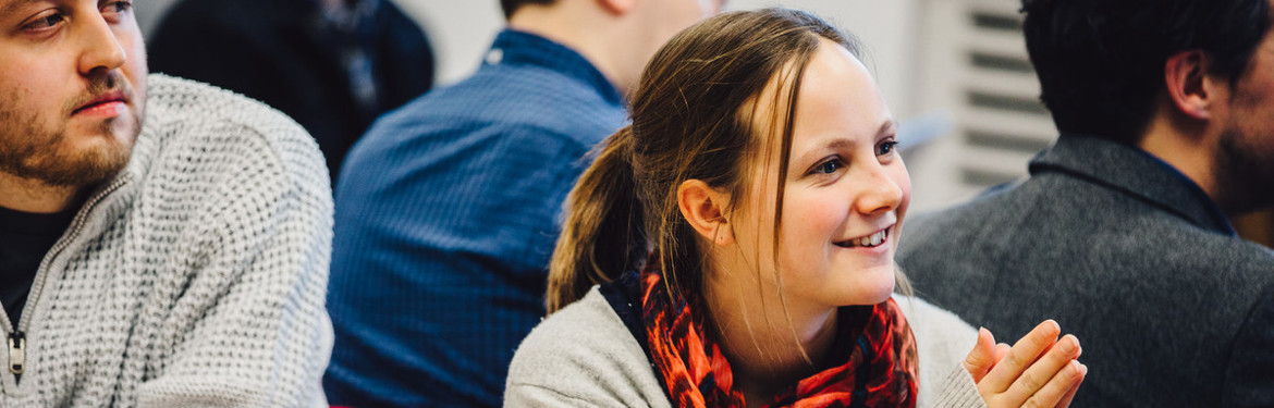 This image shows a female PGCE student in a lecture