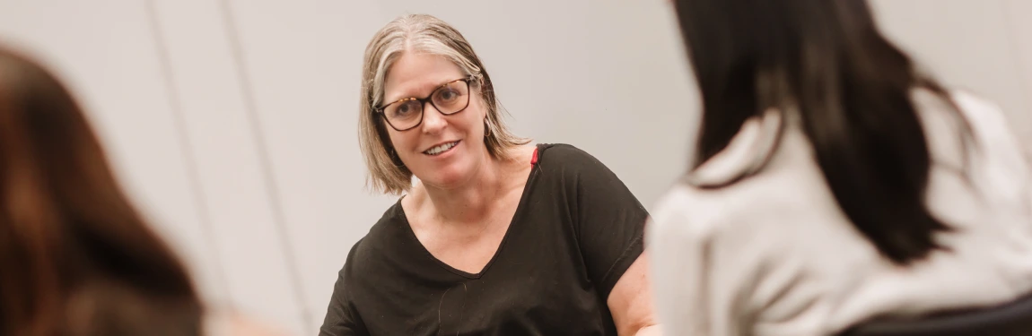 An Education Studies tutor is teaching students at University of Warwick.