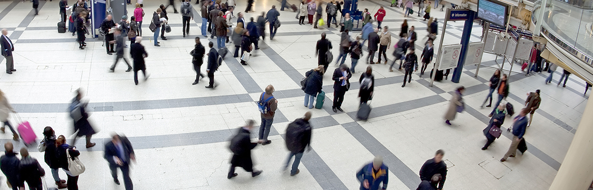 Members of public at a busy station