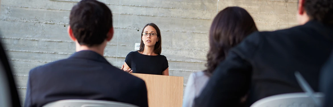 Medical leaders talking to an audience