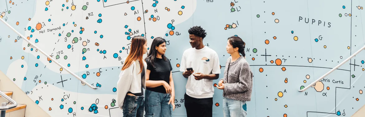 Students having a friendly discussion indoors