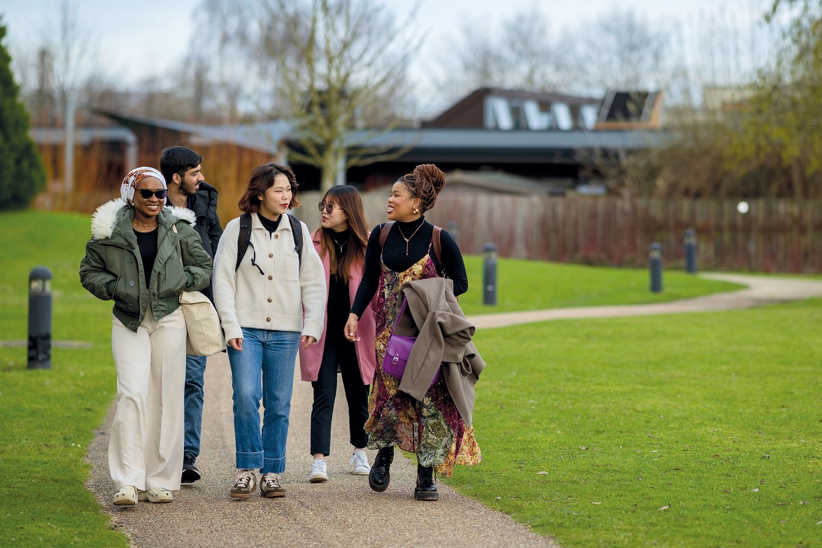 students walking and talking together - University of Warwick