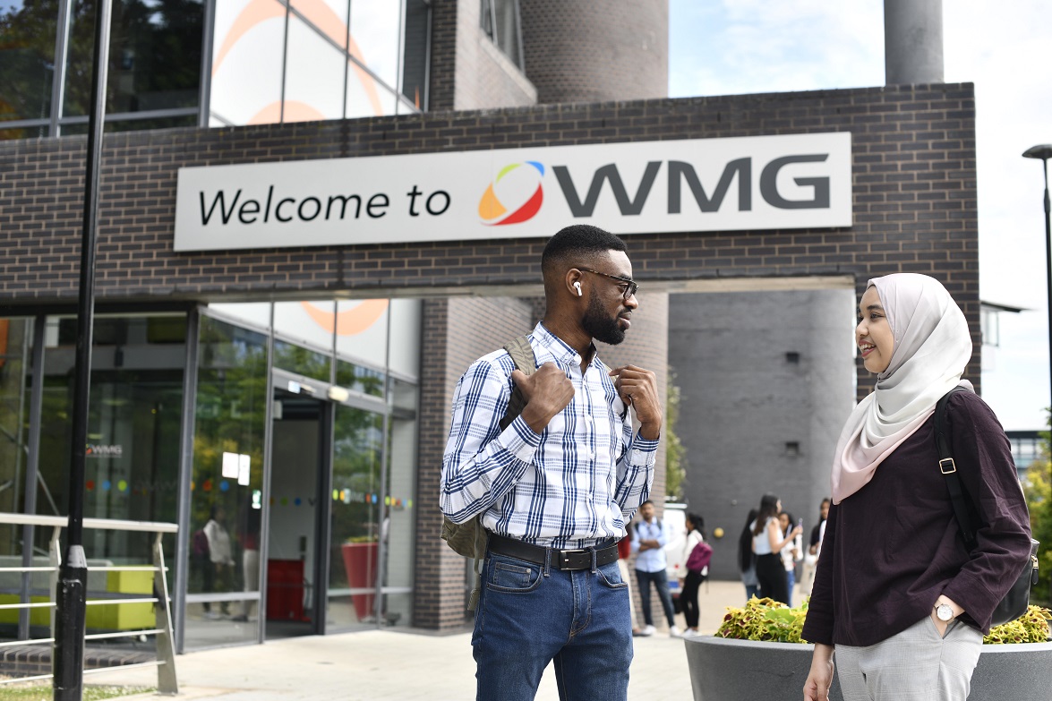 students talking outside of WMG building University of Warwick