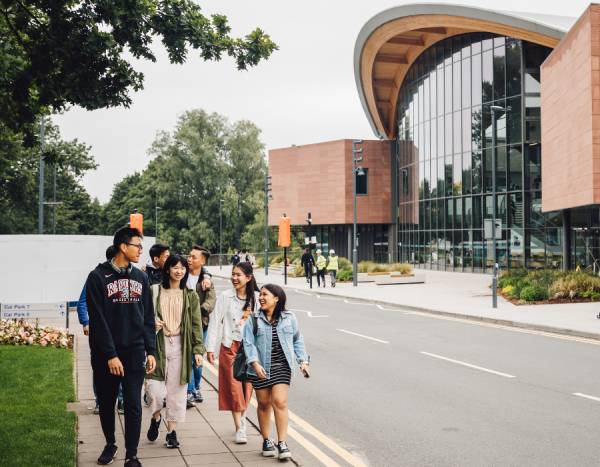 Students walking outside the Oculus building on campus