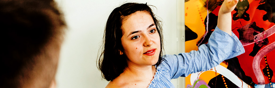 A student with a piece of Art at the University of Warwick