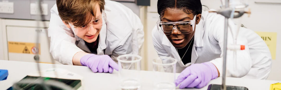 Two students in a laboratory