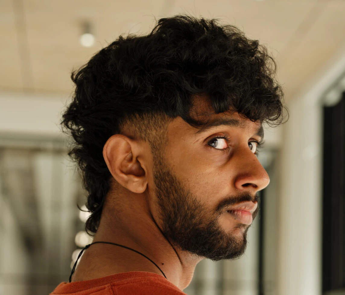 A student looking back across his shoulder